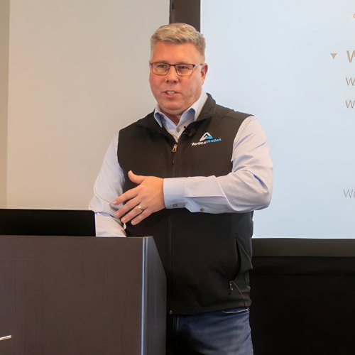 A Vertical Motion coach leading a live session