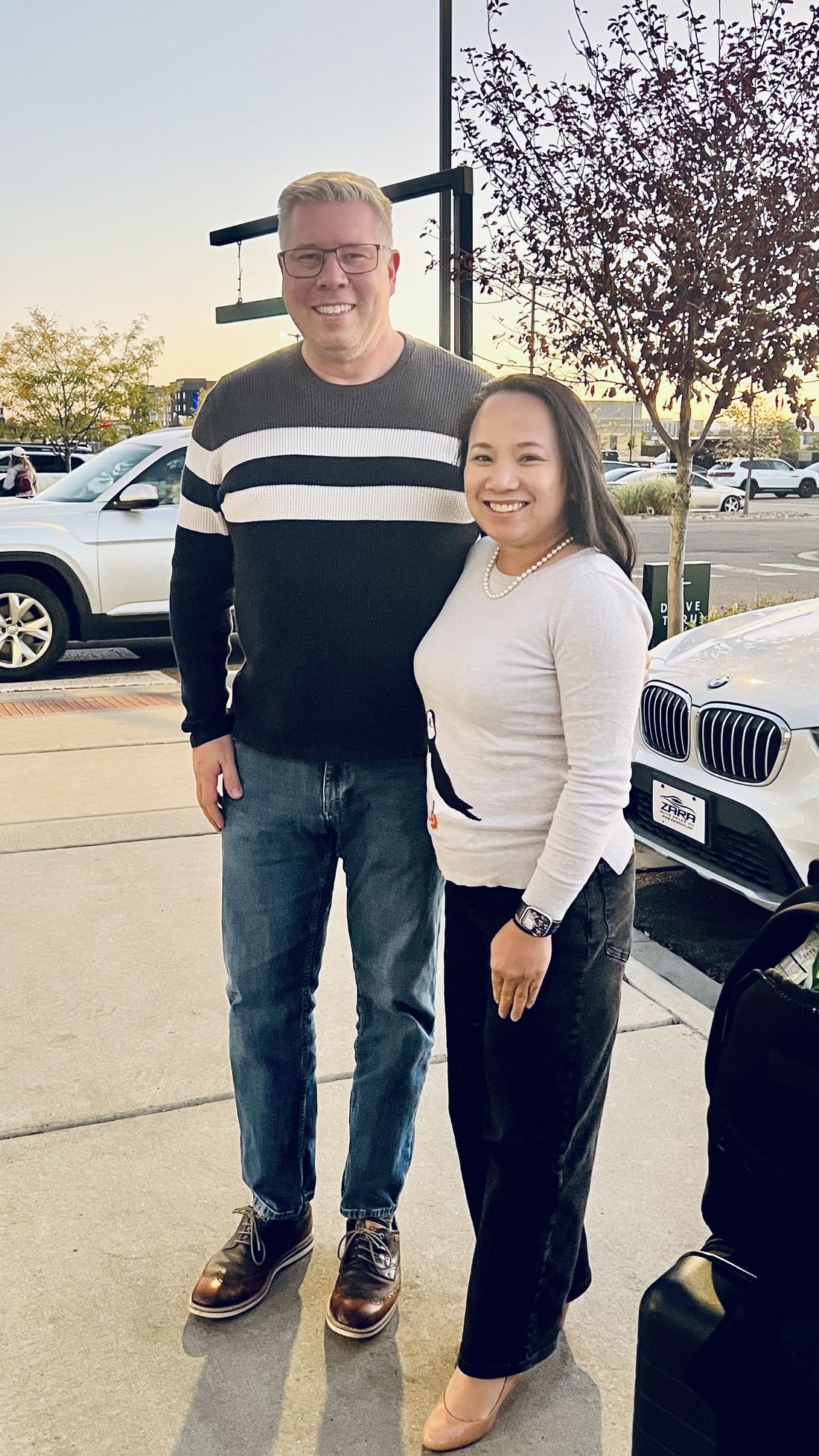 Two members outside an event