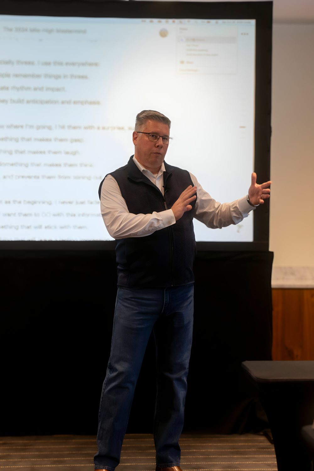 Tom Cox speaking on stage